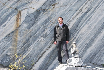 Man in Mountain park Ruskeala is tourist complex located in Sortavala region of Republic of Karelia...