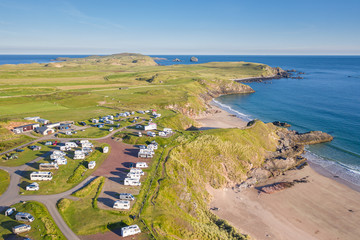 Fototapeta na wymiar Aerial View over Coastal Campsite in Scottish Highlands