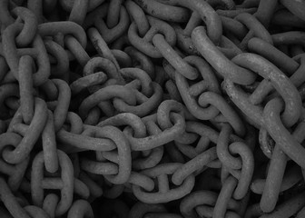 Thick rusty steel chains placed together