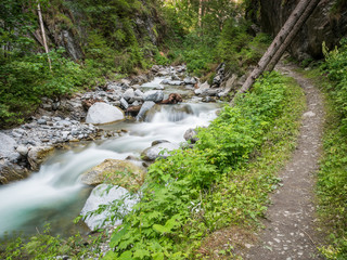 Fototapeta premium View of the Radurschl Canyon, location of a famous hiking trail in Pfunds, Tyrol, Austria