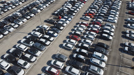 LOGISTIC AND TRADE AUTOMOBILE CENTER. DRONE AERIAL PHOTO. VEHICLE PARK