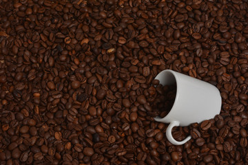 White coffee mug in fried beans