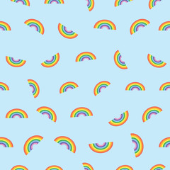 Scattered rainbow on blue background. Pattern for fabric, wrapping, textile, wallpaper, apparel. Vector illustration