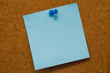 cork board reminder with stickers and push pins