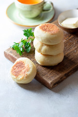 Fresh homemade English muffins. Breakfast, morning concept.