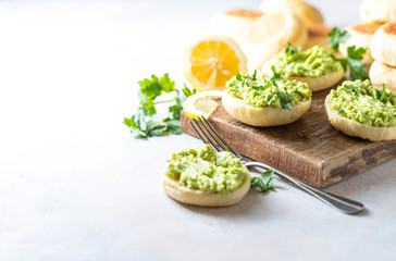 Fresh Homemade English Muffins with Avocado. Breakfast, morning concept.