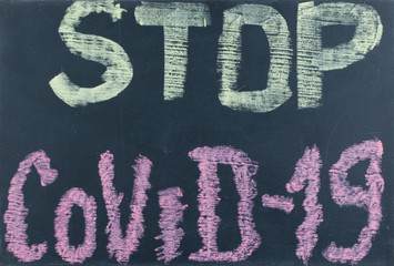 Quarantine. Outbreak Warning. written white chalk on blackboard in connection with epidemic of coronavirus worldwide.