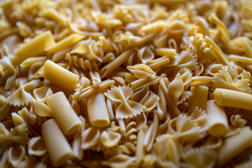 Uncooked dry pasta of differing types