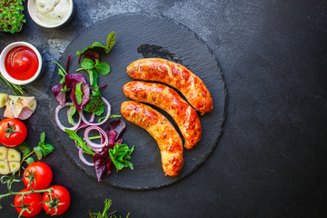 fried sausages, grilled meat or barbecue Menu concept, food background, keto or paleo diet. top...