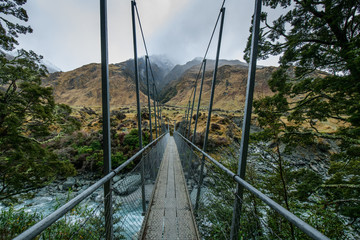 Obraz premium Snow peak with bridge in south island, Wanaka, New Zealand. Photograph in winter 2019.