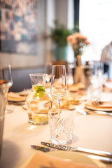 Beautiful table set for an event party or wedding reception . restaurant interior cakes on table