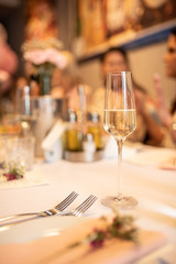 Beautiful table set for an event party or wedding reception . restaurant interior	