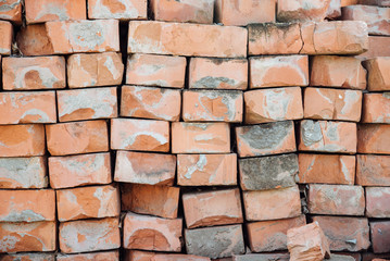 Stacked red bricks close up