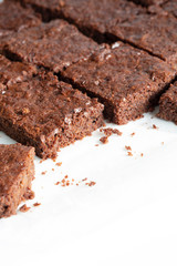 Vegan chocolate brownies chocolate plant based diet no animal products on dark background