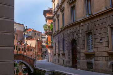Fototapeta na wymiar venetian canals and bridges .old city Venice , Italy.