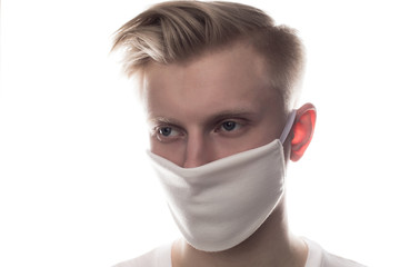 Man wearing face protective mask on face against Coronavirus isolated on white.