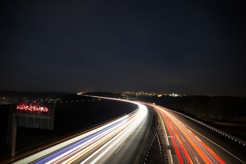 Fototapeta na wymiar Blur Cars light on the One-way road Highway 