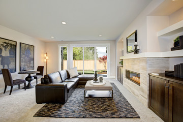 Family room design with wet bar nook. Luxury American modern home.