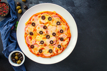 pizza sausage salami, olives and cheese. Menu concept food background. top view. copy space for text