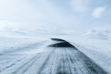 View of snow covered road in winter