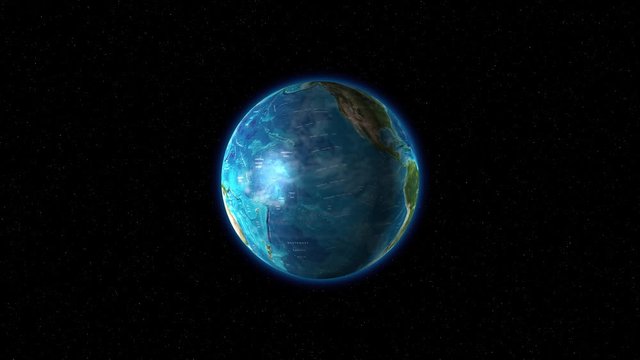 The earth's globe rotates slowly in space