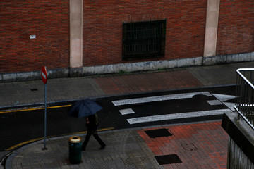 Fototapeta na wymiar Walking in a rainy day