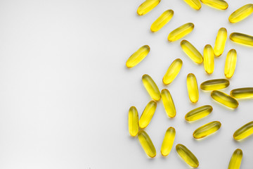 Omega-3 fish oil capsules on a white background