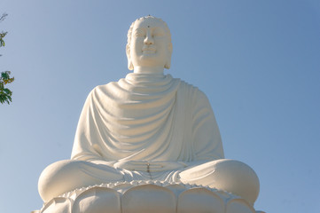White Buddha Statue at Long Son Pagoda in sunny day at Nha Trang, Vietnam.