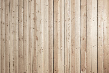 Background of a wooden wall covered with boards in vertical orientation, texture of boards in...