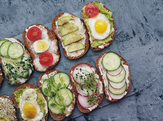 Sandwiches with healthy vegetables and micro greens.