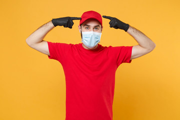 Delivery man in red cap blank t-shirt uniform sterile face mask gloves isolated on yellow...