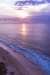 The beautiful nature of Indonesia and the island of Bali. Slopes and cliffs overlooking the waves of the blue ocean. Tropical and exotic view of travel to Asia