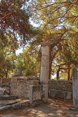 Fototapeta na wymiar old ruins of the ancient temple of Athena in Priene in Turkey on a hot summer day