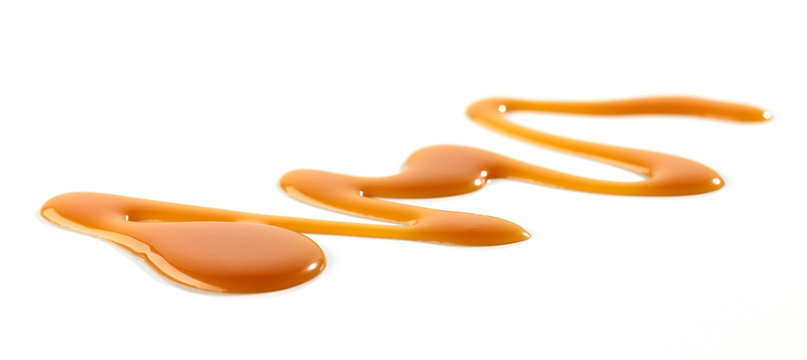 caramel sauce on white background