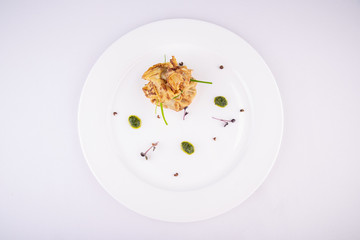 Pancake stuffed with mushrooms, served portionwise with green onions