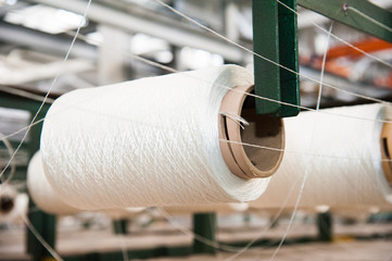 Yarn thread running in the machine