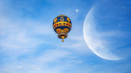 Moon in bright clouds of sunset sun . New moon , moon in the blue sky new moon in the clouds . Balloon flies to stars © yaalan