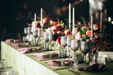 Wedding table decoration luxury style in mint colors with flowers