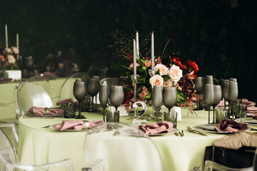 Wedding table decoration luxury style in mint colors with flowers