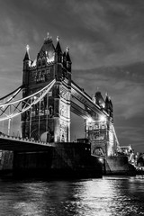 Fototapeta na wymiar Tower Bridge at night in London, UK in black and white
