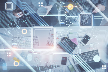 Double exposure of man and woman working together and data theme hologram drawing. Computer background. Top View.