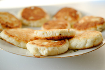 curd pancake on a white plate.
