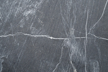 Carbon stone gray texture. scratched surface. geological background