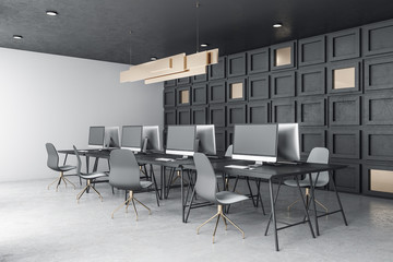 Contemporary coworking office interior with computers