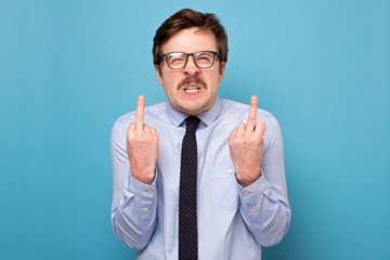 Fuck sign. Anger man showing fuck at camera.