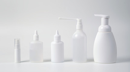 Medical antiseptic and hygiene products, hand sanitizers are used to destroy microbes, bacteria and viruses: gel, antibacterial agent, alcohol solution, medical solution. White bottles on a white