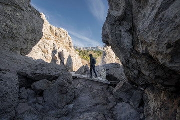 The rock in Crimea. The place on Black sea. Backpacker on nature.