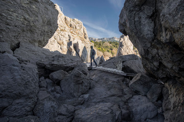 The rock in Crimea. The place on Black sea. Backpacker on nature.