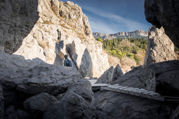 The rock in Crimea. The place on Black sea. Backpacker on nature.