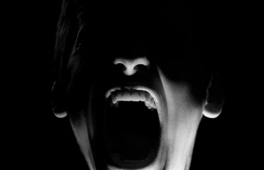 black and white dramatic portrait of a guy